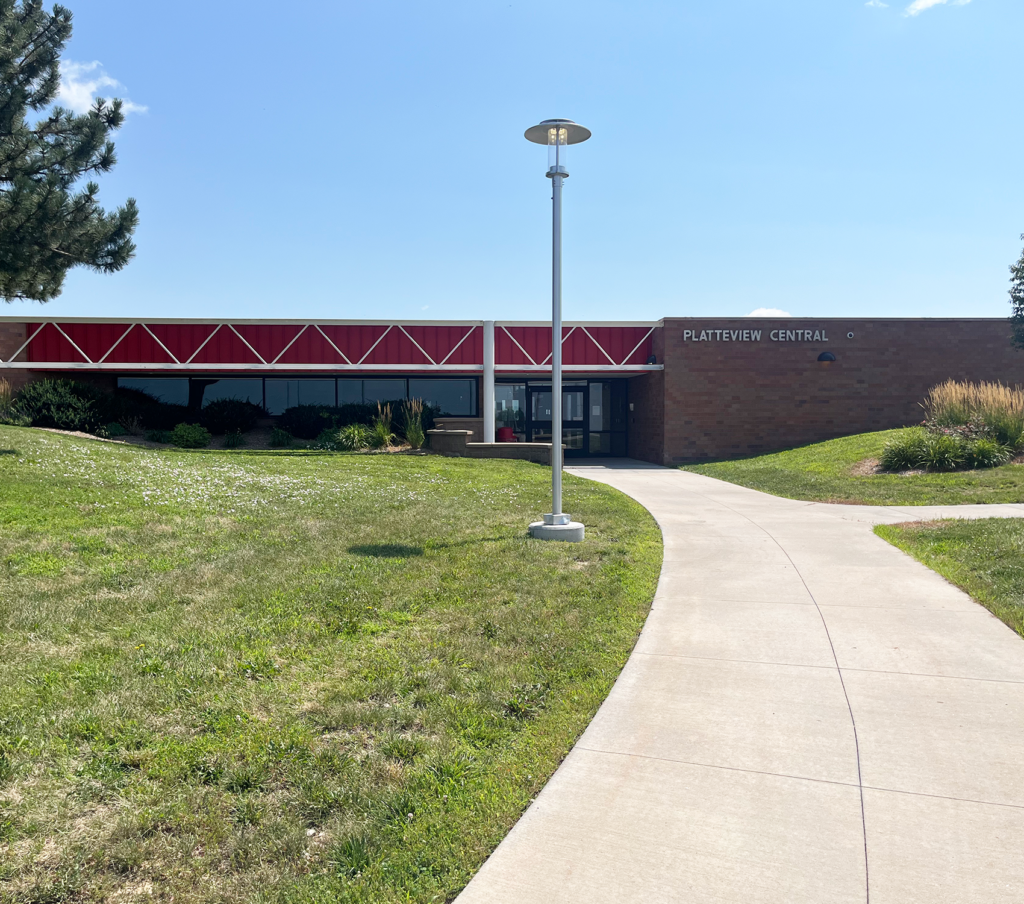 the front of Platteview Central Junior high School on a sunny day