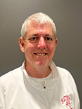 A picture of Bruce Thayer, who works at the administration building