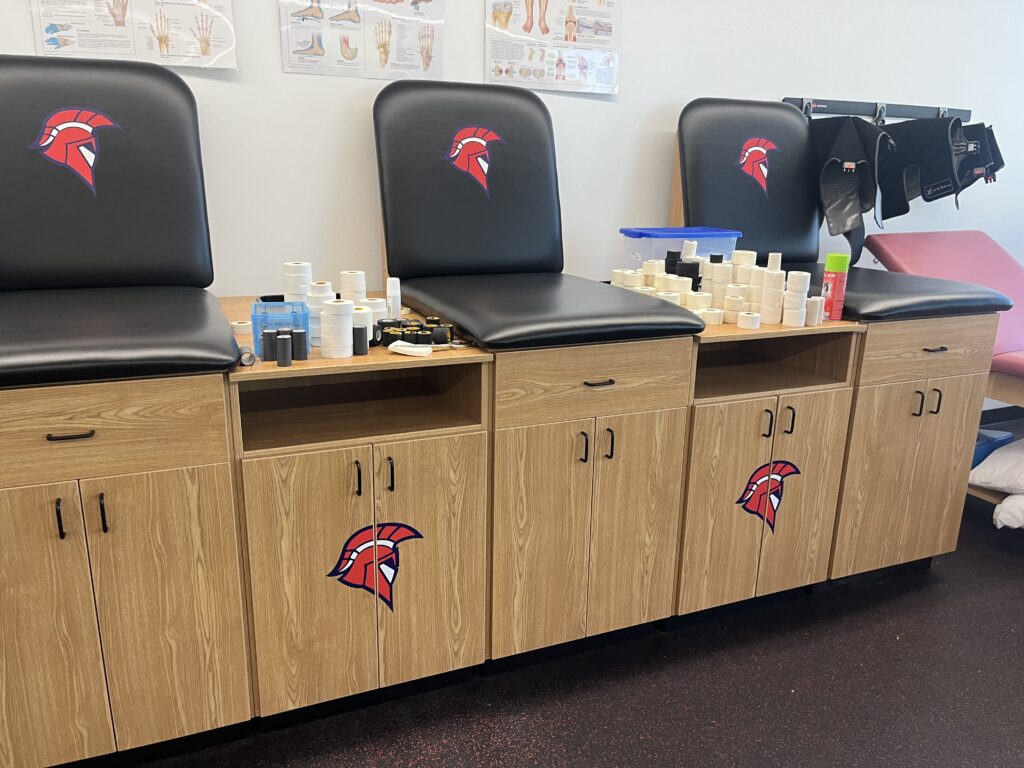 strength and fitness chairs with trojan logo on them at Platteview High School